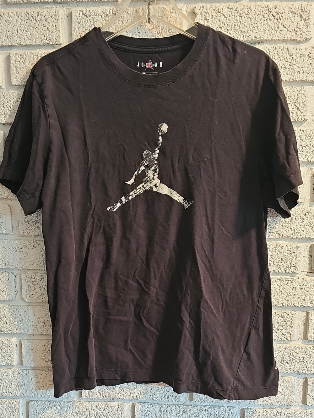 Jordan Black Short Sleeve Tee with Distressed Jumpman Graphic